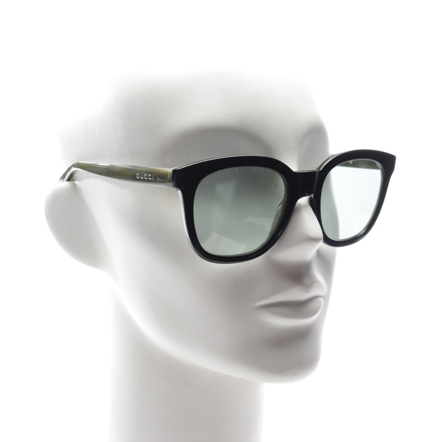 Sonnenbrille von Gucci in Graugrün und Schwarz GG0571S Neu