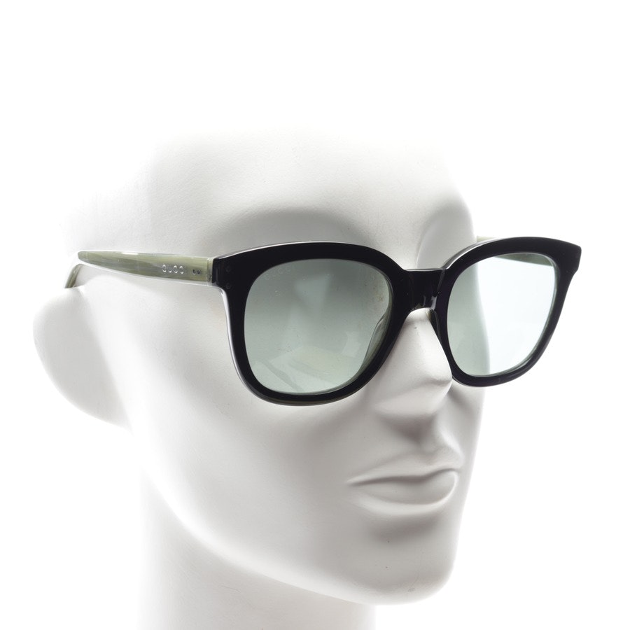 Sonnenbrille von Gucci in Grau und Schwarz GG0571S Neu